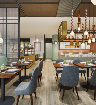 man in a suit works at his desk selling cars