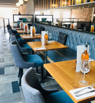 Restaurant indoor table scape with chairs